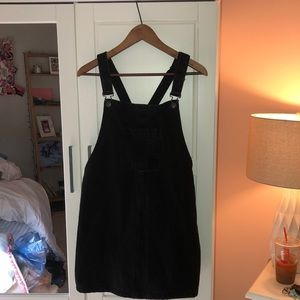 this is a black overall dress.